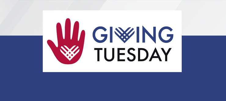 Giving Tuesday with read hand and heart in palm of hand